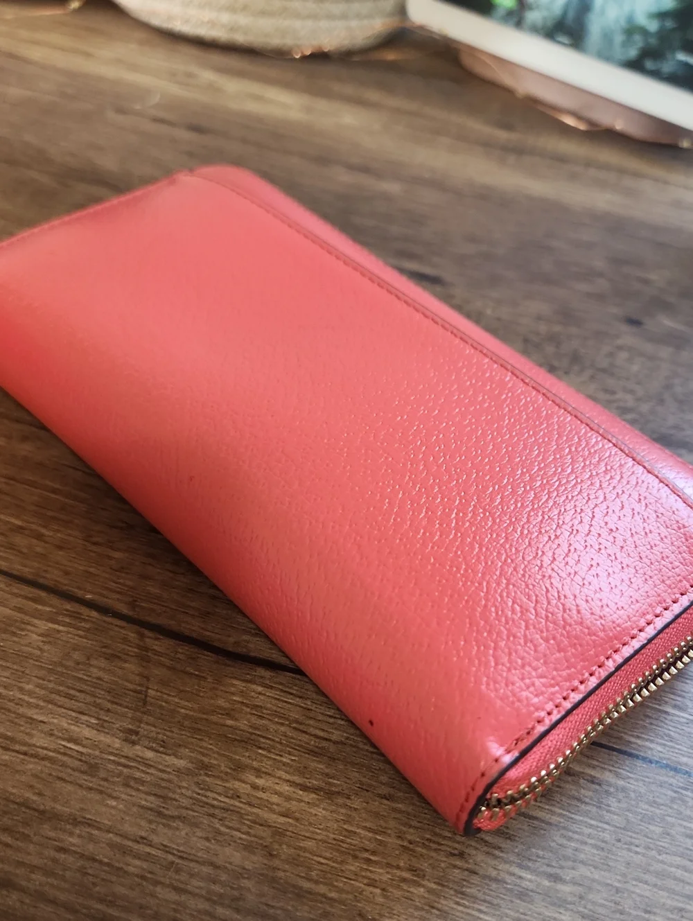 kate spade coral zip-around wallet with gold logo